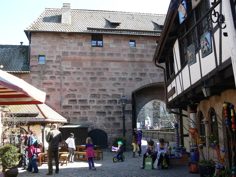 The Handwerkerhof craft courtyard inside the Frauentor gate tower